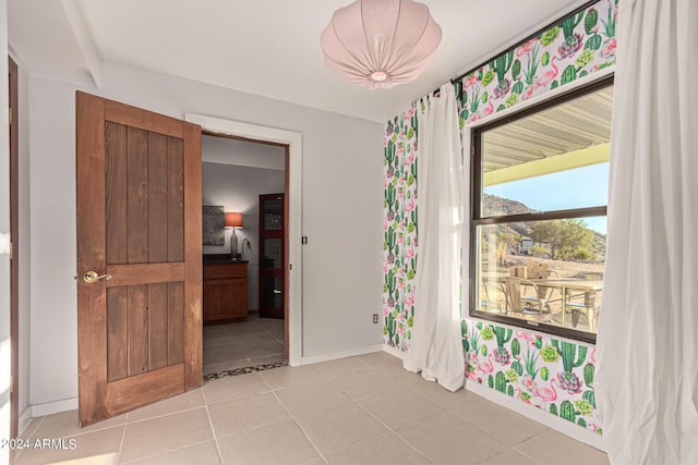 interior space featuring light tile patterned floors