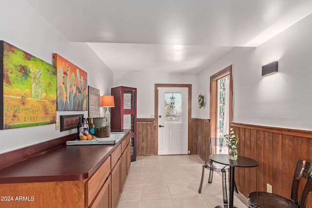 interior space featuring wood walls