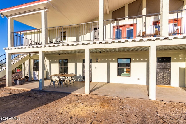 1060 S Kellis Rd, Wickenburg, AZ 85390 - rear view of house with stairway and a patio