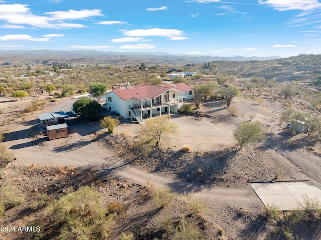 birds eye view of property featuring a mountain view