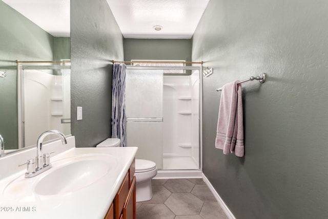 152 N 194th Ln, Buckeye, AZ 85326 - bathroom featuring toilet, a stall shower, vanity, and tile patterned flooring