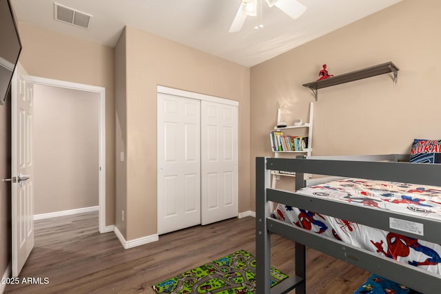 152 N 194th Ln, Buckeye, AZ 85326 - bedroom featuring a closet, baseboards, visible vents, ceiling fan, and wood finished floors