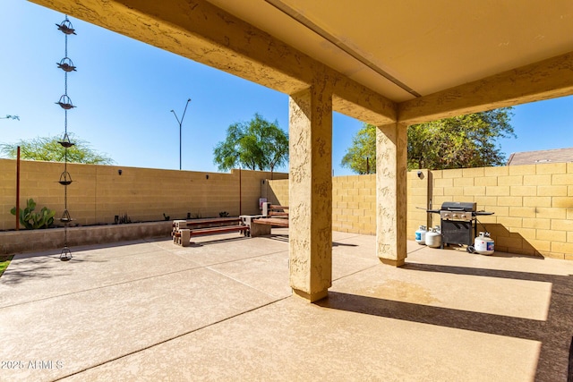 152 N 194th Ln, Buckeye, AZ 85326 - view of patio featuring a fenced backyard and area for grilling