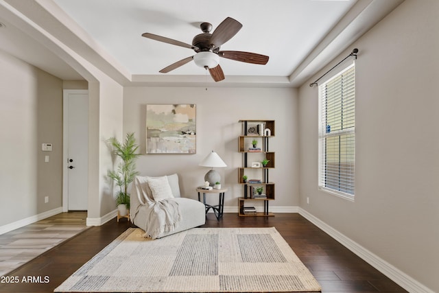 10331 E Starion Ave, Mesa, AZ 85212 - sitting room with a raised ceiling, wood finished floors, ceiling fan, and arched walkways