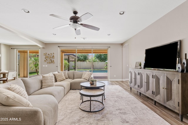 10331 E Starion Ave, Mesa, AZ 85212 - living area with a ceiling fan, light wood-style flooring, and recessed lighting