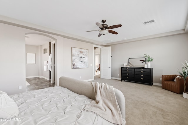 10331 E Starion Ave, Mesa, AZ 85212 - carpeted bedroom with arched walkways and a ceiling fan