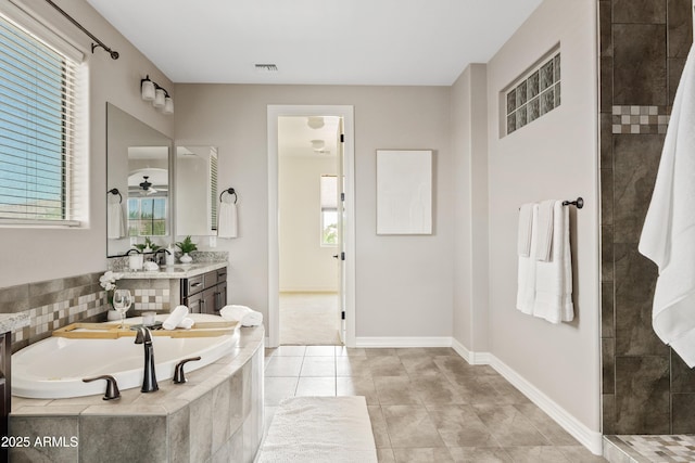 10331 E Starion Ave, Mesa, AZ 85212 - bathroom featuring a bath, vanity, plenty of natural light, and tiled shower