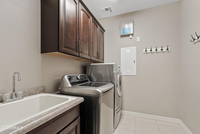 10331 E Starion Ave, Mesa, AZ 85212 - laundry area with separate washer and dryer, cabinet space, and light tile patterned floors