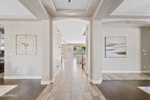 10331 E Starion Ave, Mesa, AZ 85212 - foyer featuring arched walkways, wood finished floors, and a tray ceiling