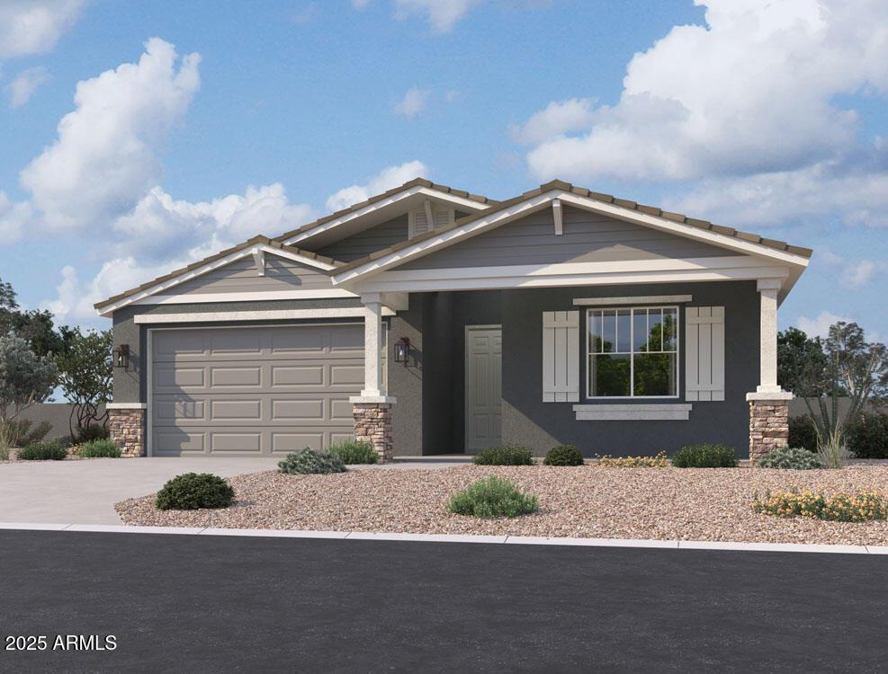 craftsman-style house with a garage and covered porch