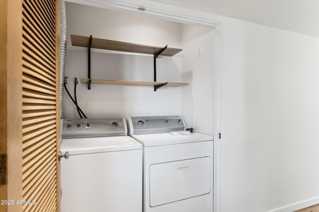 laundry area with washer and dryer