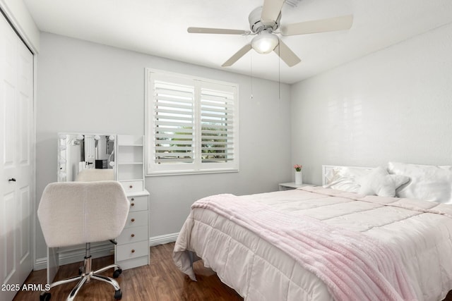 bedroom with a closet, ceiling fan, and wood finished floors