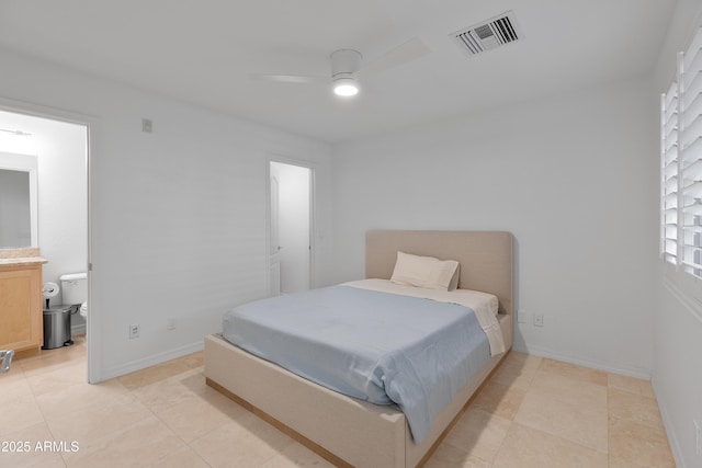 bedroom with connected bathroom and ceiling fan