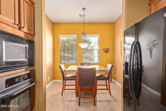 view of tiled dining area