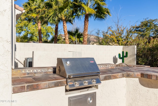 view of patio / terrace with a grill and area for grilling