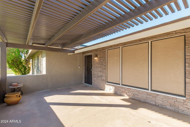 view of patio / terrace featuring a pergola