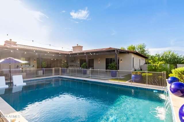 view of pool featuring pool water feature