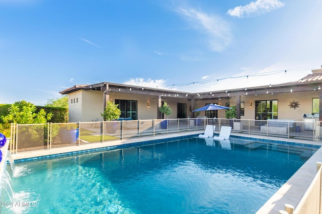 view of pool featuring pool water feature