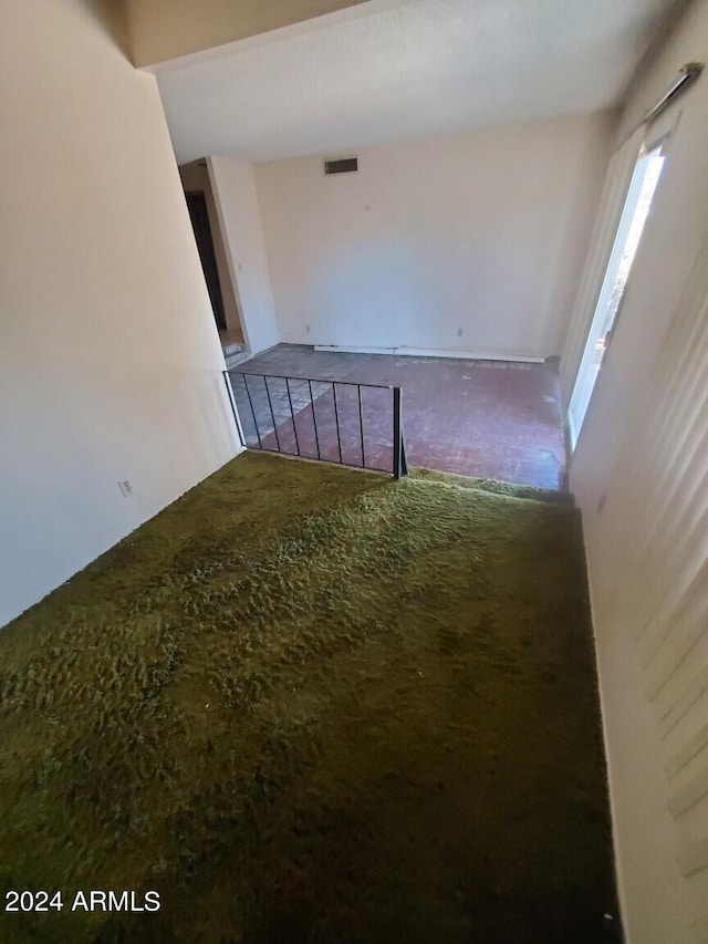 empty room featuring visible vents