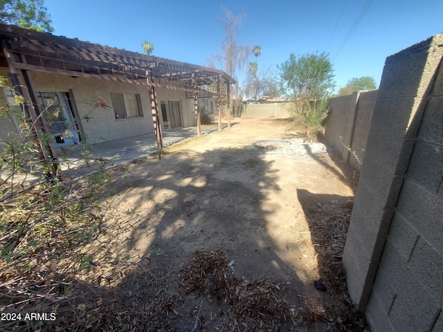 view of yard with a patio and a fenced backyard