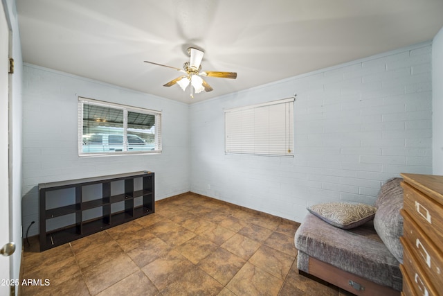 117 Peretz Cir, Morristown, AZ 85342 - sitting room with ceiling fan and brick wall