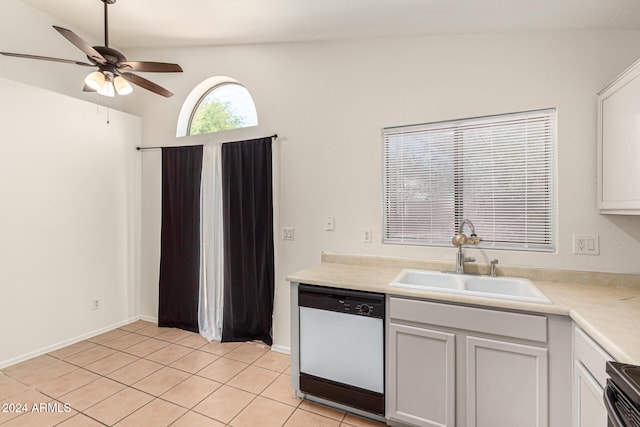 kitchen featuring white cabinets, sink, dishwasher, stainless steel stove, and lofted ceiling