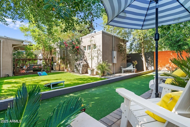 view of yard featuring fence