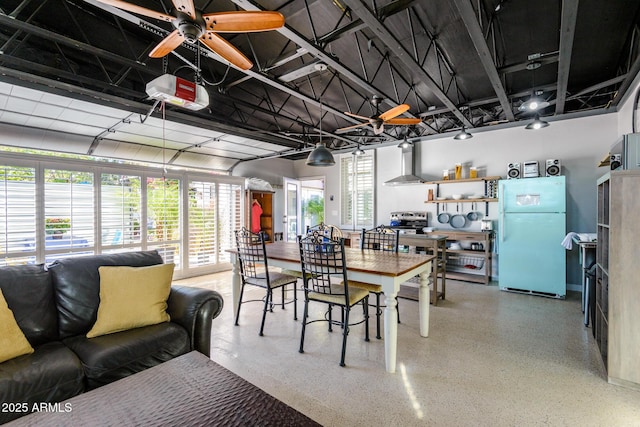 dining area with speckled floor