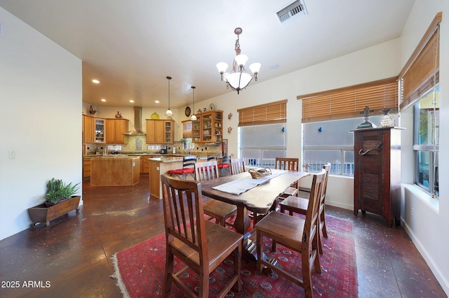 dining area featuring a chandelier