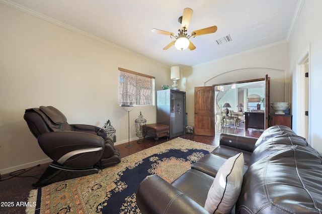 living room with crown molding, ceiling fan, and wood-type flooring