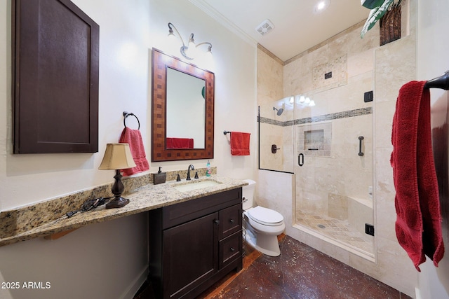 bathroom featuring ornamental molding, toilet, a shower with door, and vanity