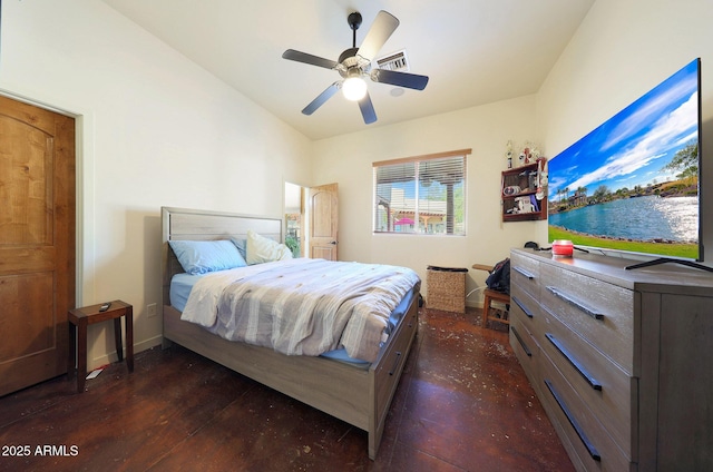 bedroom with lofted ceiling, dark hardwood / wood-style floors, and ceiling fan