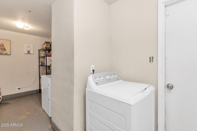 laundry area with separate washer and dryer