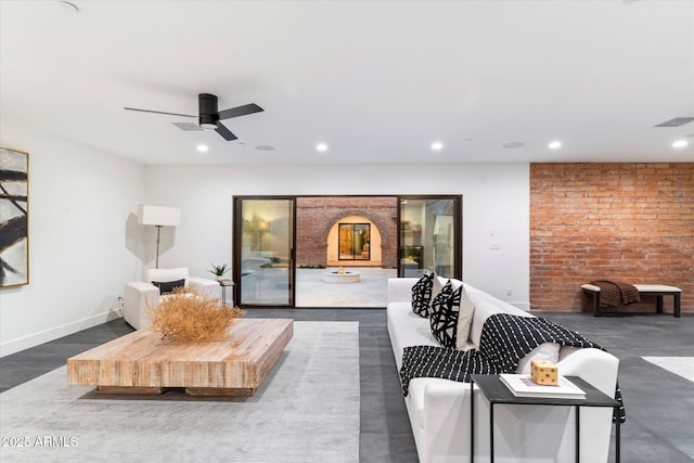 living room featuring dark hardwood / wood-style flooring and ceiling fan