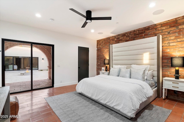 bedroom featuring access to outside and ceiling fan