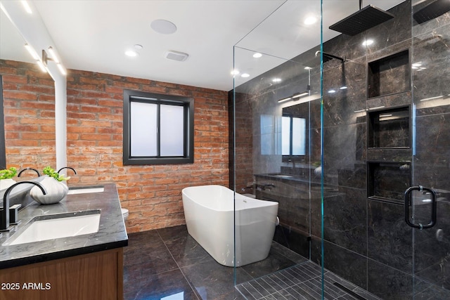 bathroom featuring vanity and separate shower and tub