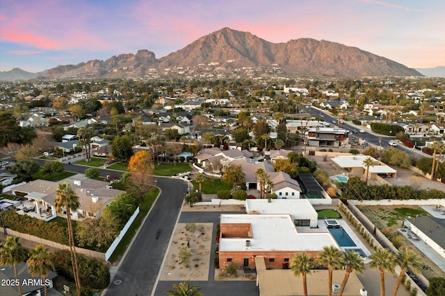 aerial view at dusk with a mountain view