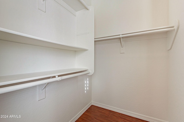 1912 E Gemini Pl, Chandler, AZ 85249 - spacious closet featuring dark wood-style flooring