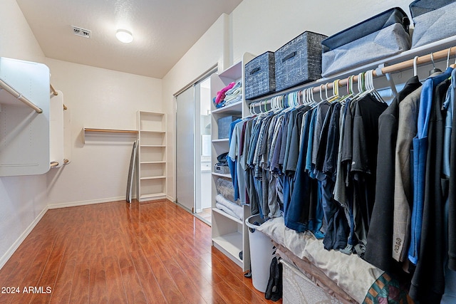 walk in closet featuring wood-type flooring