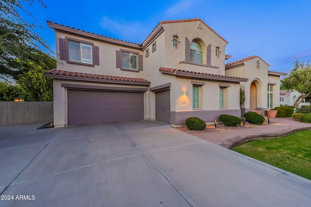 1912 E Gemini Pl, Chandler, AZ 85249 - mediterranean / spanish home with an attached garage, stucco siding, a tile roof, and driveway