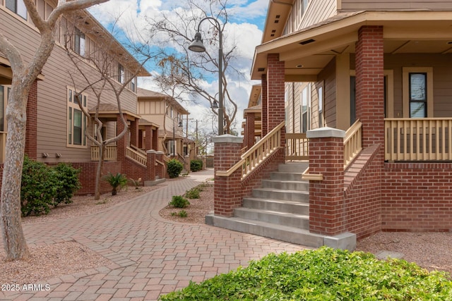 doorway to property with covered porch