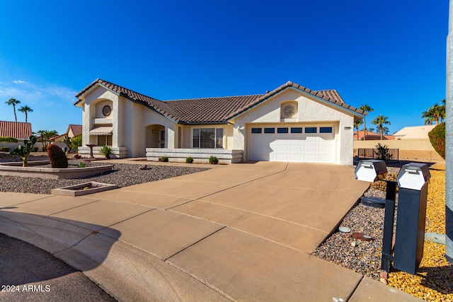 view of front of property featuring a garage