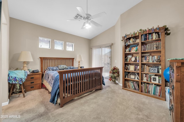 carpeted bedroom featuring baseboards, a ceiling fan, vaulted ceiling, and visible vents