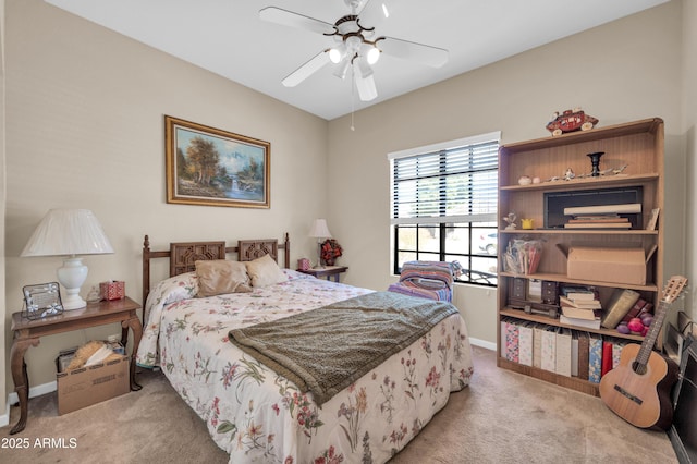 bedroom featuring baseboards, carpet flooring, and ceiling fan