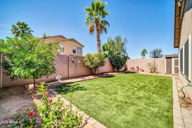 view of yard featuring a fenced backyard