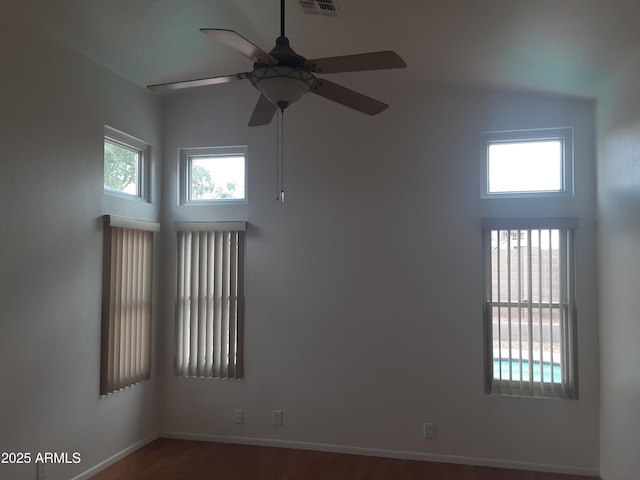 12205 N 41st Ln, Phoenix, AZ 85029 - empty room featuring ceiling fan and wood finished floors