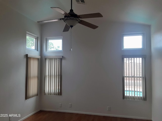 12205 N 41st Ln, Phoenix, AZ 85029 - spare room with ceiling fan and dark wood-style floors