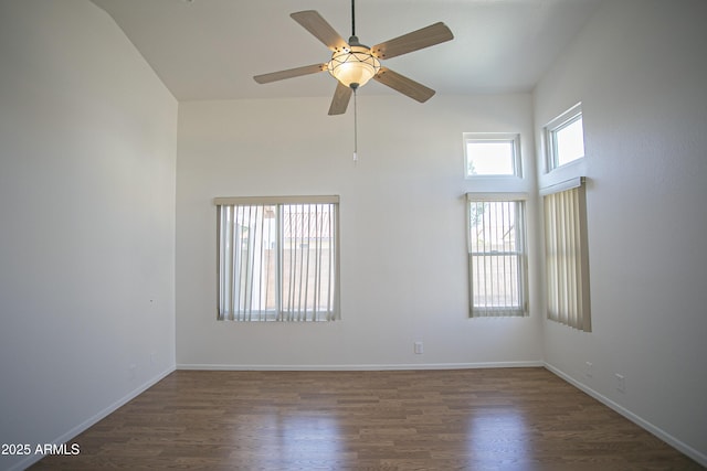 12205 N 41st Ln, Phoenix, AZ 85029 - spare room with a high ceiling, ceiling fan, and wood finished floors