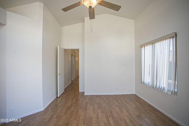 12205 N 41st Ln, Phoenix, AZ 85029 - spare room with wood finished floors, high vaulted ceiling, and a ceiling fan