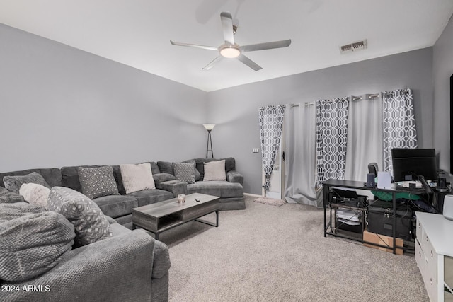 living room with carpet flooring and ceiling fan